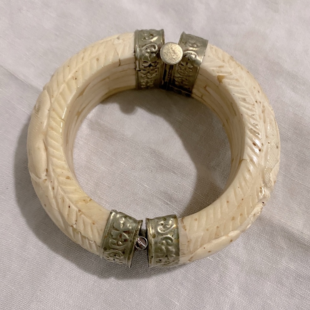 Vintage hand carved ivory bracelet. An heirloom from the before times.